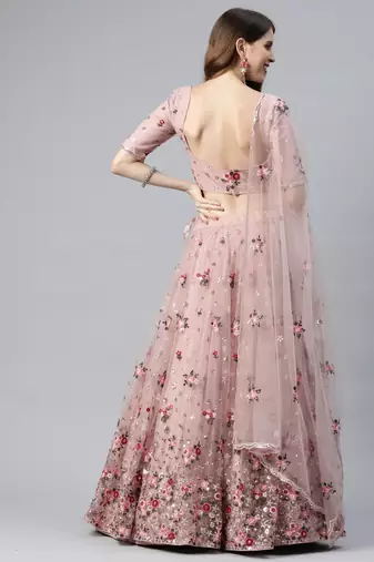 Enchanting light pink embroidered net wedding lehenga choli with dupatta