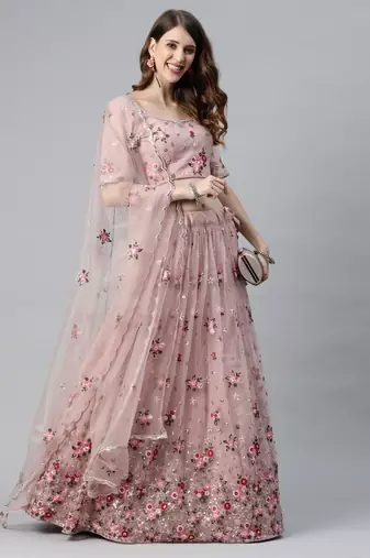 Enchanting light pink embroidered net wedding lehenga choli with dupatta