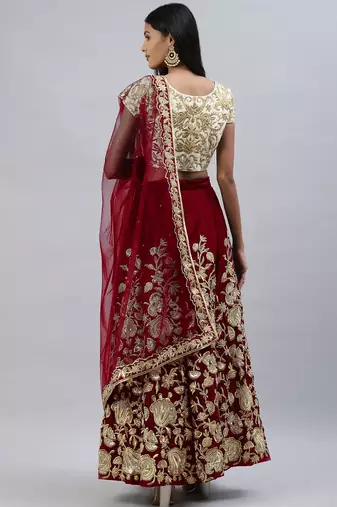 Maroon zari sequins embroidered velvet lehenga choli