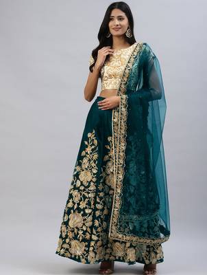 Turquoise zari sequins embroidered velvet lehenga choli 1