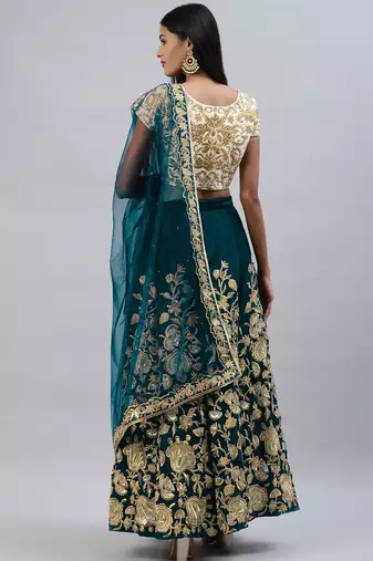 Turquoise zari sequins embroidered velvet lehenga choli