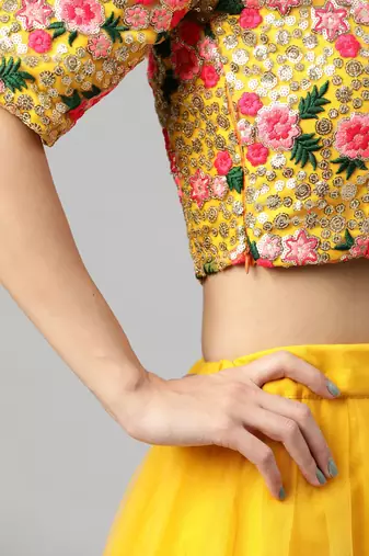 Women's yellow embroidered sequinned semi stitched lehenga & unstitched blouse with dupatta