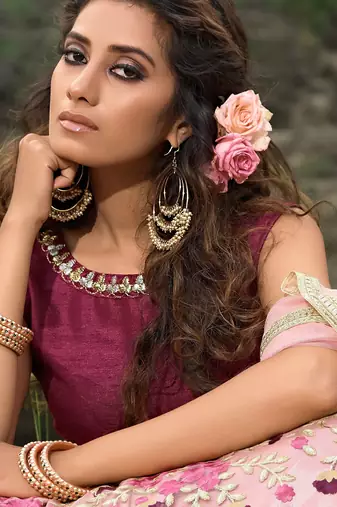 Glamorous multi-colored soft net base flared lehenga choli