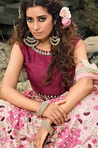 Glamorous multi-colored soft net base flared lehenga choli
