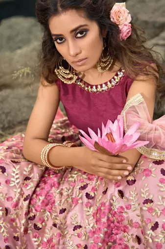 Glamorous multi-colored soft net base flared lehenga choli