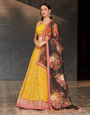 yellow & black dori zari sequins and thread embroidered georgette indian lehenga choli dress designs 2