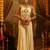 Cream georgette embroidered top with mirror, thread, tassels, shells and palazzo set