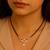 18k rose gold plated traditional single line american diamond pendant with black bead chain mangalsutra for women (d101)