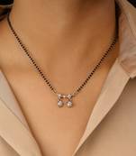 Rose gold plated traditional single line american diamond pendant with black bead chain mangalsutra for women 