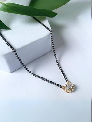 Rose gold plated traditional single line american diamond pendant with black bead chain mangalsutra for women  1