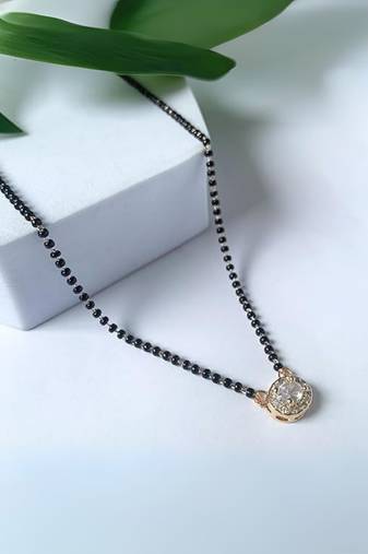 Rose gold plated traditional single line american diamond pendant with black bead chain mangalsutra for women (oval)