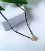 Rose gold plated traditional single line american diamond pendant with black bead chain mangalsutra for women
