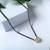 Rose gold plated traditional single line american diamond pendant with black bead chain mangalsutra for women (oval)