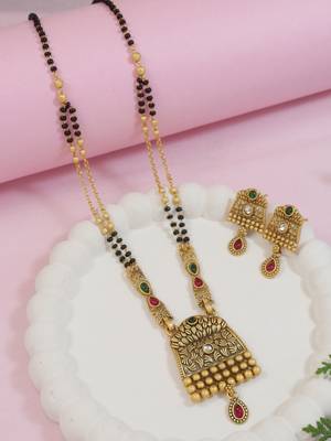 Gold plated traditional studded pendant & black bead chain mangalsutra with earrings for women  1