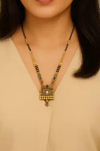 Gold plated traditional studded pendant & black bead chain mangalsutra with earrings for women 