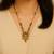 Gold plated traditional studded pendant & black bead chain mangalsutra with earrings for women (d123)