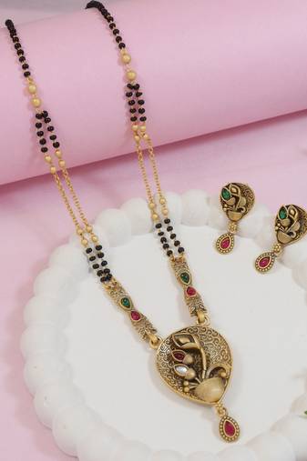 Gold plated traditional studded pendant & black bead chain mangalsutra with earrings for women 
