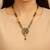 Gold plated traditional studded pendant & black bead chain mangalsutra with earrings for women (d124)