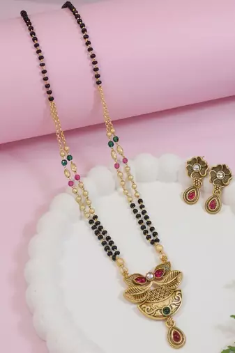 Gold plated traditional studded pendant & black bead chain mangalsutra with earrings for women 