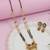 Gold plated traditional studded pendant & black bead chain mangalsutra with earrings for women (d125)