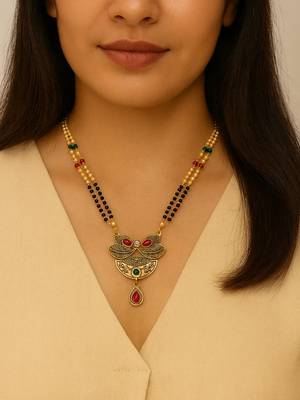 Gold plated traditional studded pendant & black bead chain mangalsutra with earrings for women  2