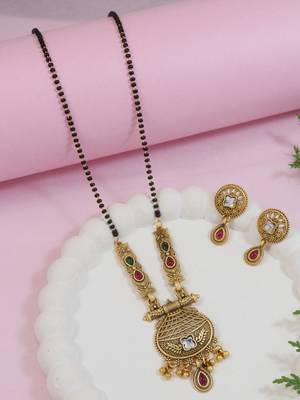 Gold plated traditional studded pendant & black bead chain mangalsutra with earrings for women  1