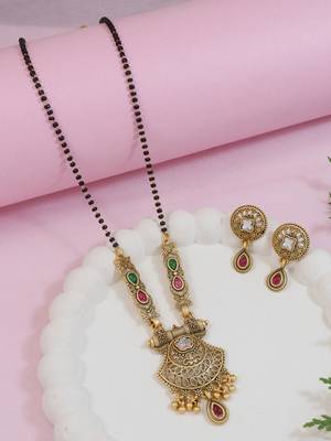 Gold plated traditional studded pendant & black bead chain mangalsutra with earrings for women  1