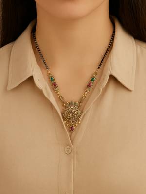 Gold plated traditional studded pendant & black bead chain mangalsutra with earrings for women  2