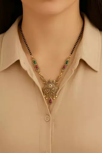 Gold plated traditional studded pendant & black bead chain mangalsutra with earrings for women 