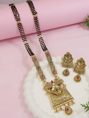 Gold plated traditional studded pendant & black bead chain mangalsutra with earrings for women  1