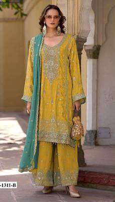 Yellow heavy chinon semi stitched suit with embroidery bits work 1
