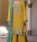 Yellow heavy chinon semi stitched suit with embroidery bits work