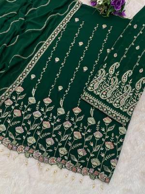 Dark green heavy fox georgette suit with embroidery  3