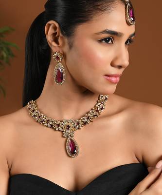 Gold plated stylish design crystal diamond traditional floral necklace with earrings & maang tikka jewellery 1