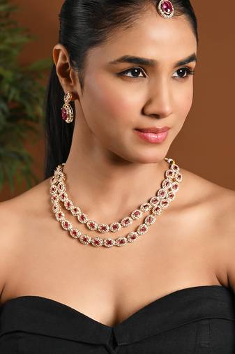 Gold plated stylish design crystal diamond oval shape necklace with earrings & maang tikka jewellery