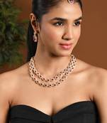 Gold plated stylish design crystal diamond oval shape necklace with earrings & maang tikka jewellery