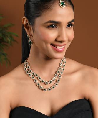 Gold plated stylish design crystal diamond oval shape necklace with earrings & maang tikka jewellery 1