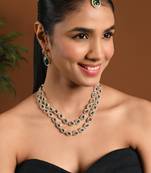 Gold plated stylish design crystal diamond oval shape necklace with earrings & maang tikka jewellery