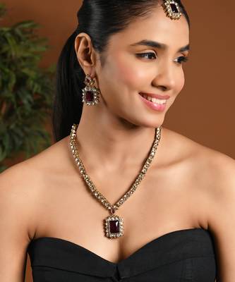Gold plated stylish design crystal diamond necklace with earrings & maang tikka jewellery set for women  1