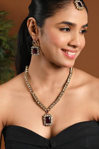 Gold plated stylish design crystal diamond necklace with earrings & maang tikka jewellery set for women (wine)