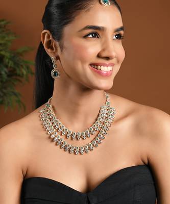 Gold plated stylish design crystal diamond necklace with earrings & maang tikka jewellery set for women  1