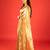 Gold embroidered tissue saree