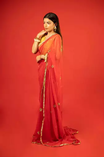 Red embroidered chiffon saree