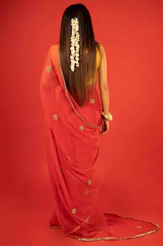 Red embroidered chiffon saree