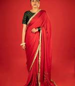 Red embroidered satin saree