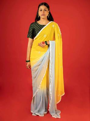 Yellow embroidered georgette saree 1