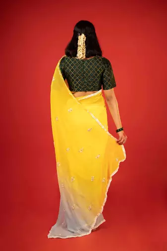Yellow embroidered georgette saree