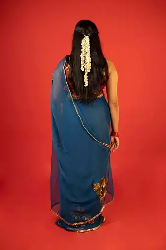 Turquoise embroidered chiffon saree