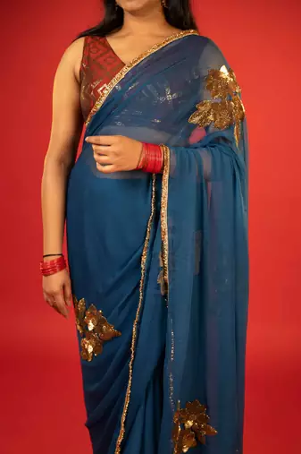 Turquoise embroidered chiffon saree