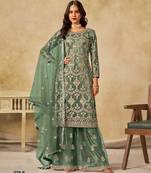 Green heavy net semi stitched suit with embroidery work